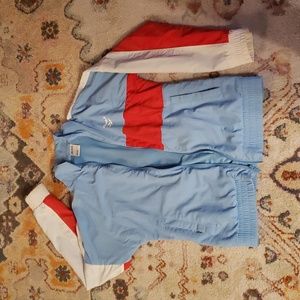 Baby blue Reebok windbreaker